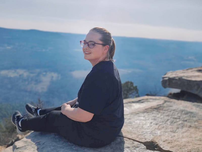 Sarah Steinsiek at Pinnacle Mountain State Park in Arkansas. Hiking is one of the ways she stays healthy since her mom's death from heart disease. (Photo courtesy of Sarah Steinsiek)